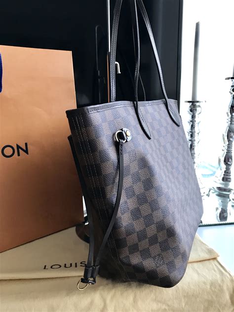 louis vuitton damier ebene canvas eva|Louis Vuitton mm neverfull.